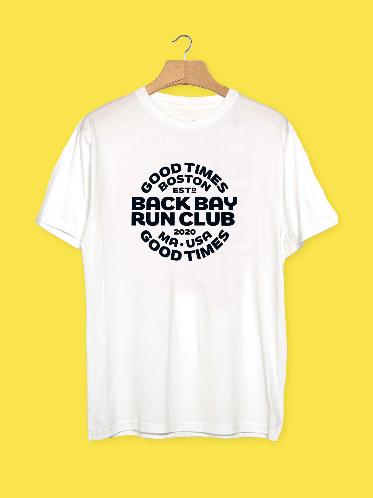 Black typographic 'Good Times' badge printed on a white t-shirt, created by Dan Fleming for Back Bay Run Club, established 2020 in Boston
