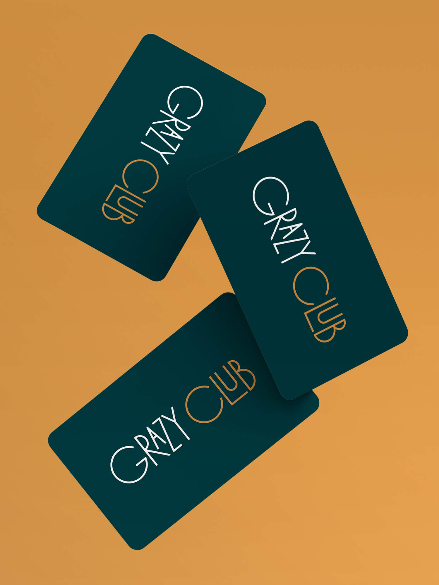 Three Grazy Club membership cards falling from above