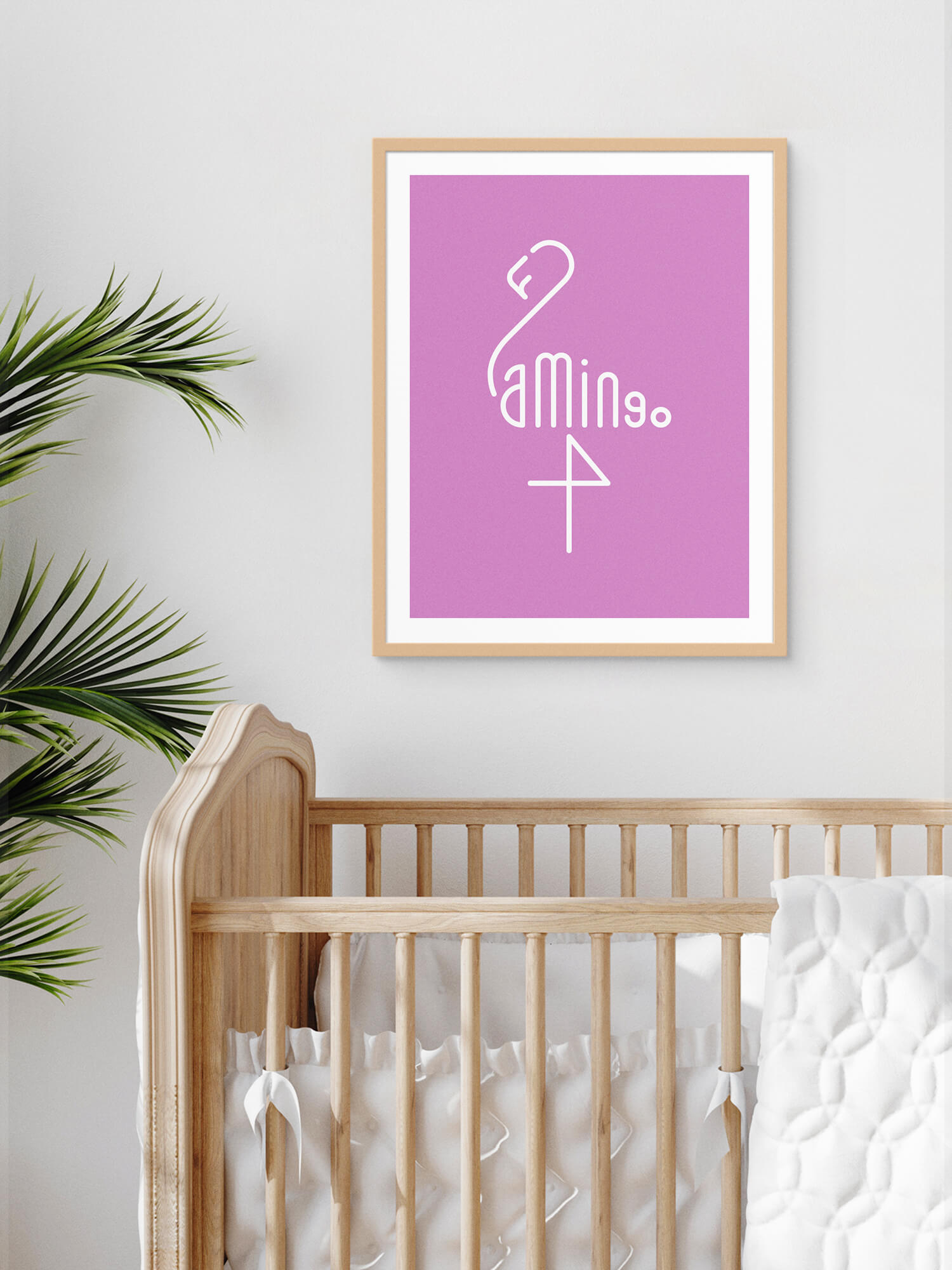 Framed Word Animals print displaying the illustration of a flamingo on the wall of a babies room