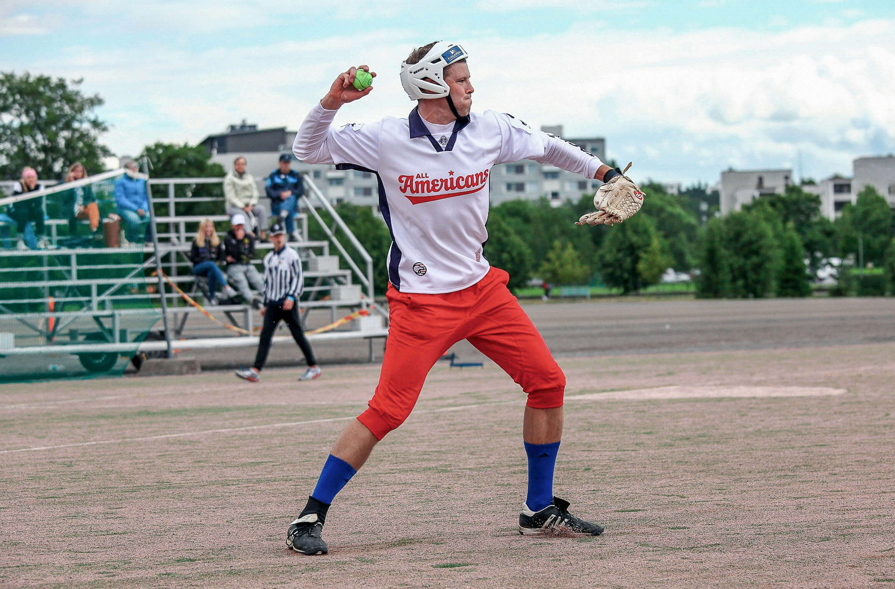 An All Americans player throwing during a Pesäpallo World Cup match