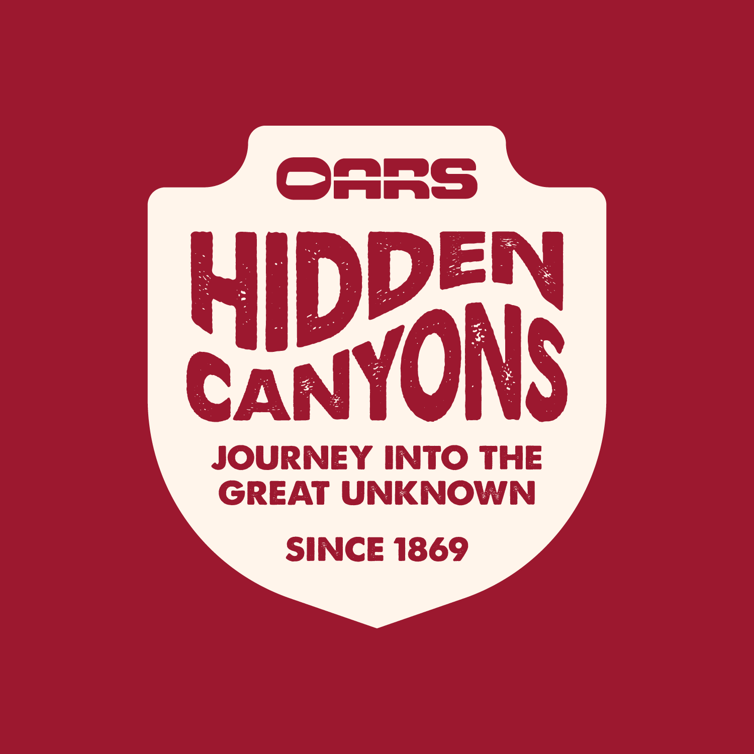 Cream and red Hidden Canyons badge reading 